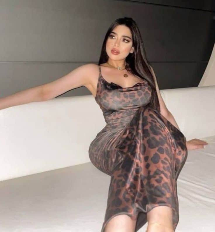 Petite call girl smiling in room ready for short-time hotel booking